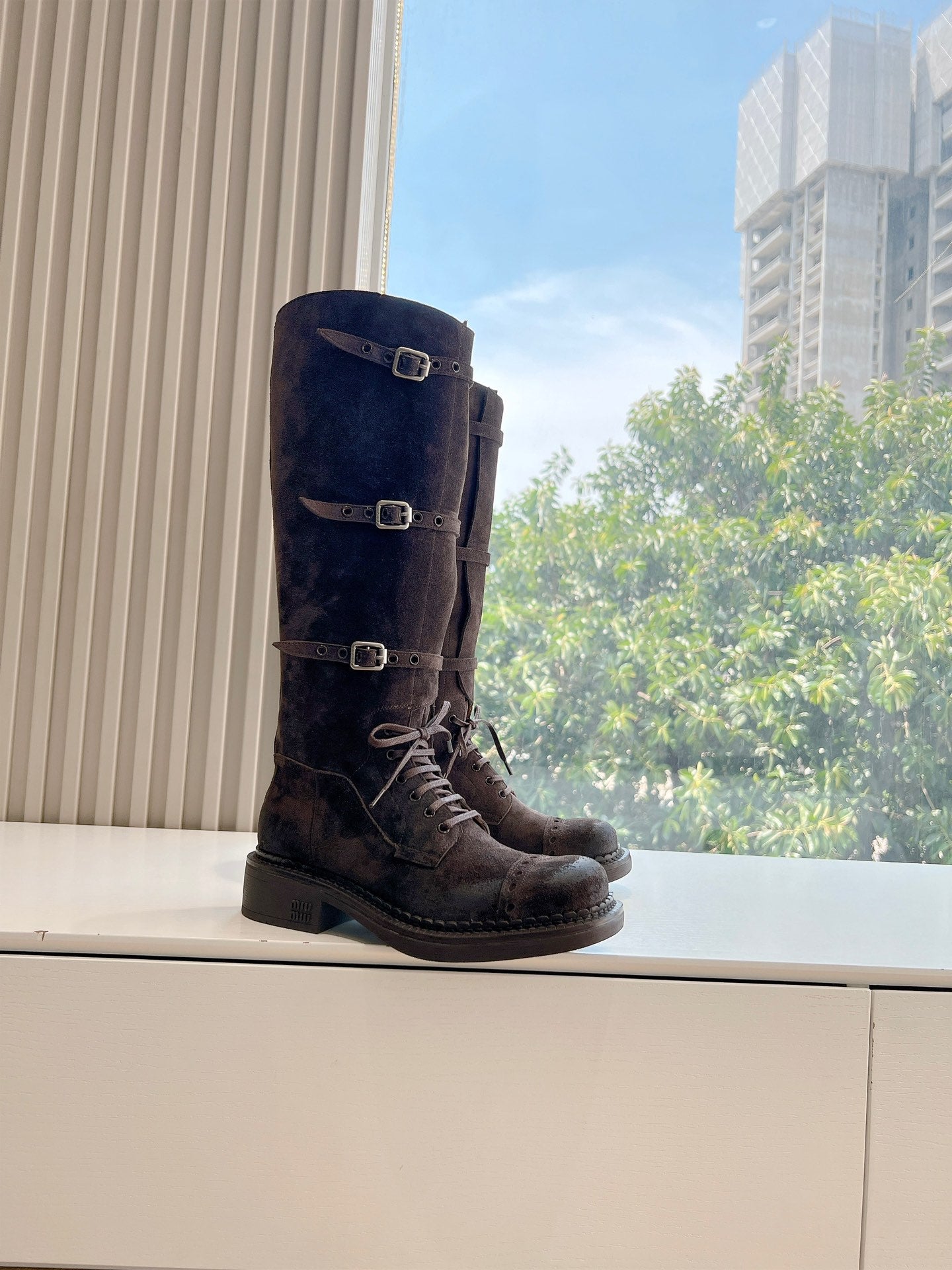 Miu Miu Biker Style Distressed Knee-High Boots – Autumn/Winter Collection