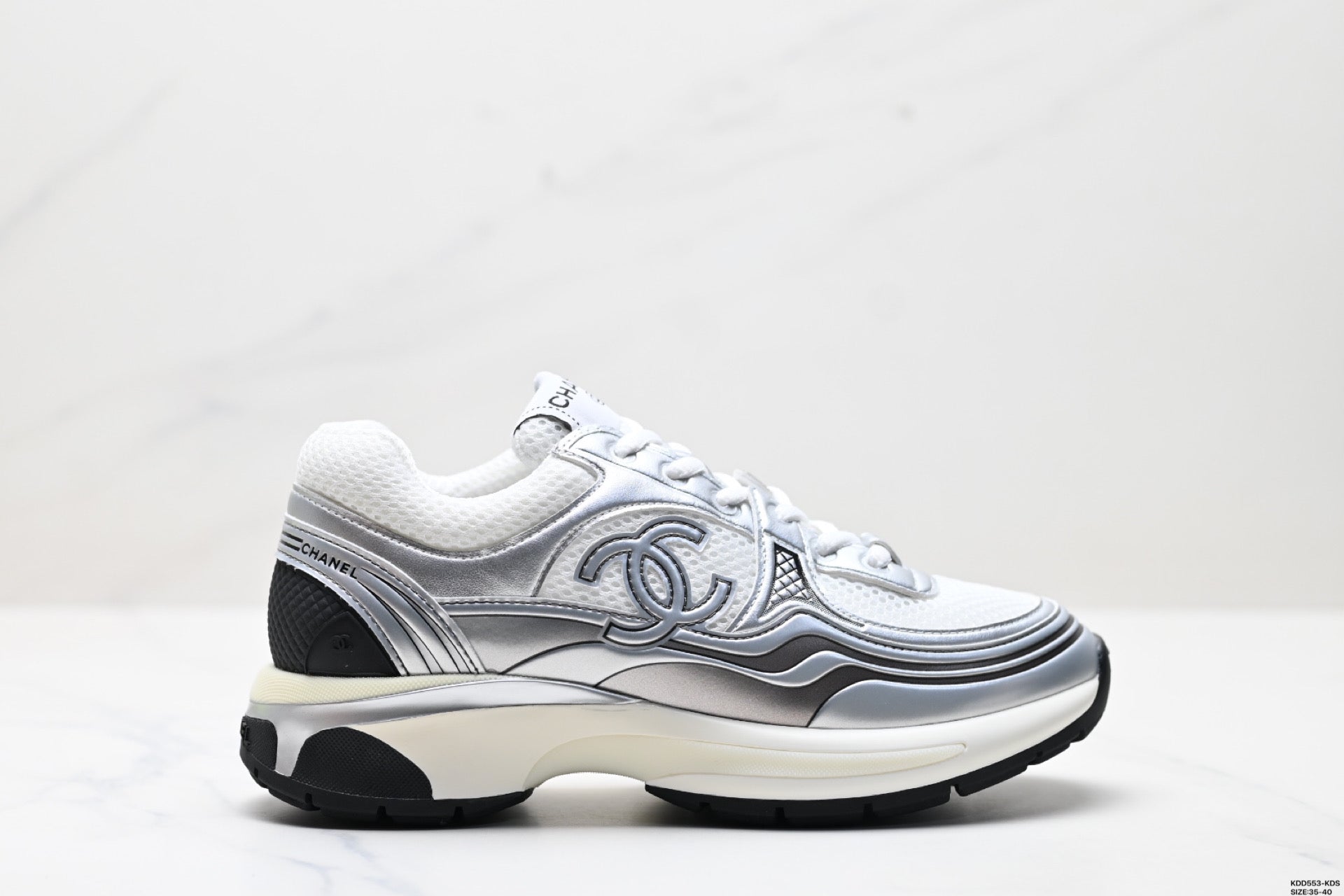 Chanel Leather Logo Low-Top Sneakers