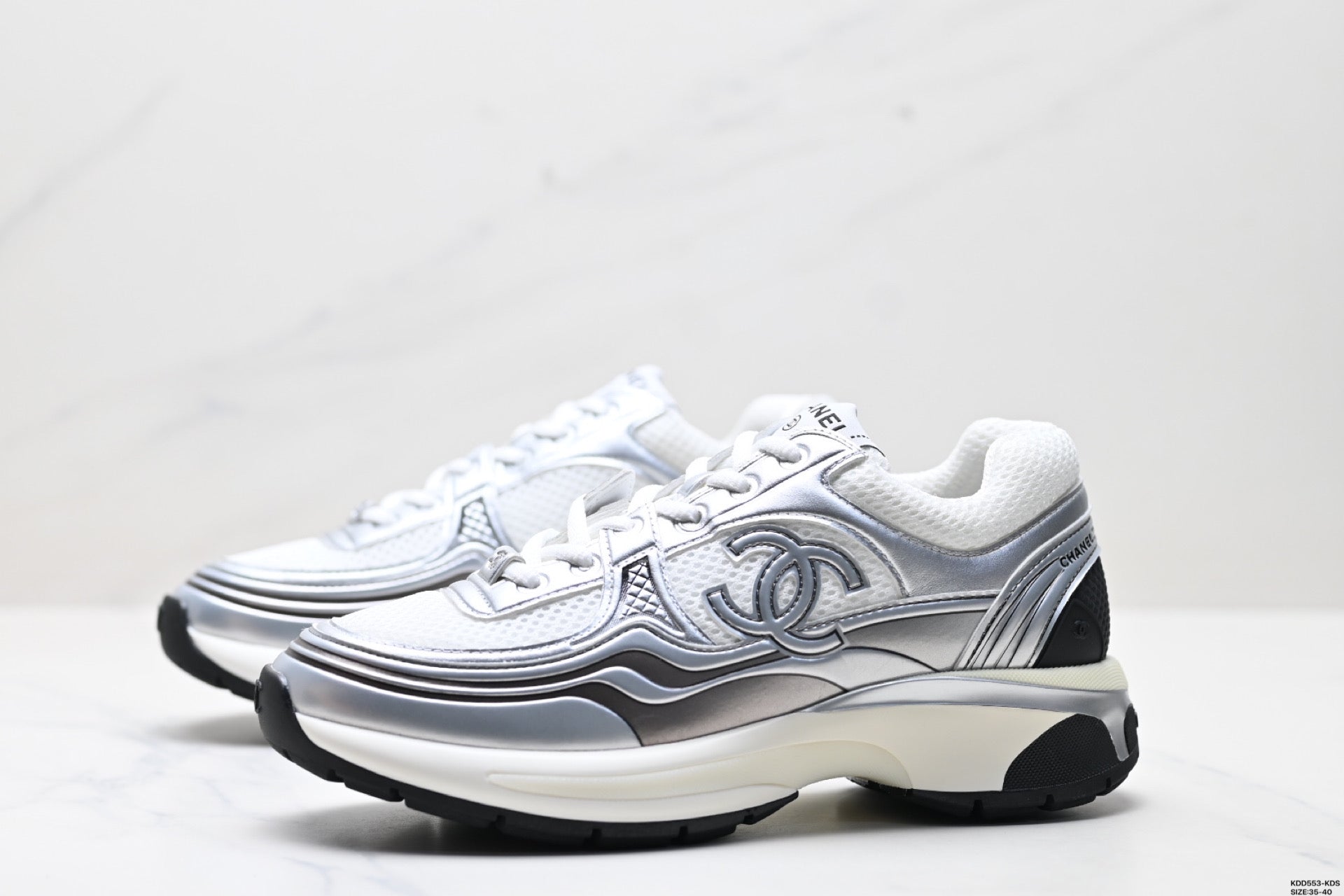Chanel Leather Logo Low-Top Sneakers