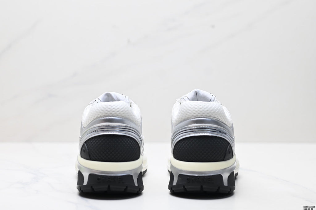 Chanel Leather Logo Low-Top Sneakers