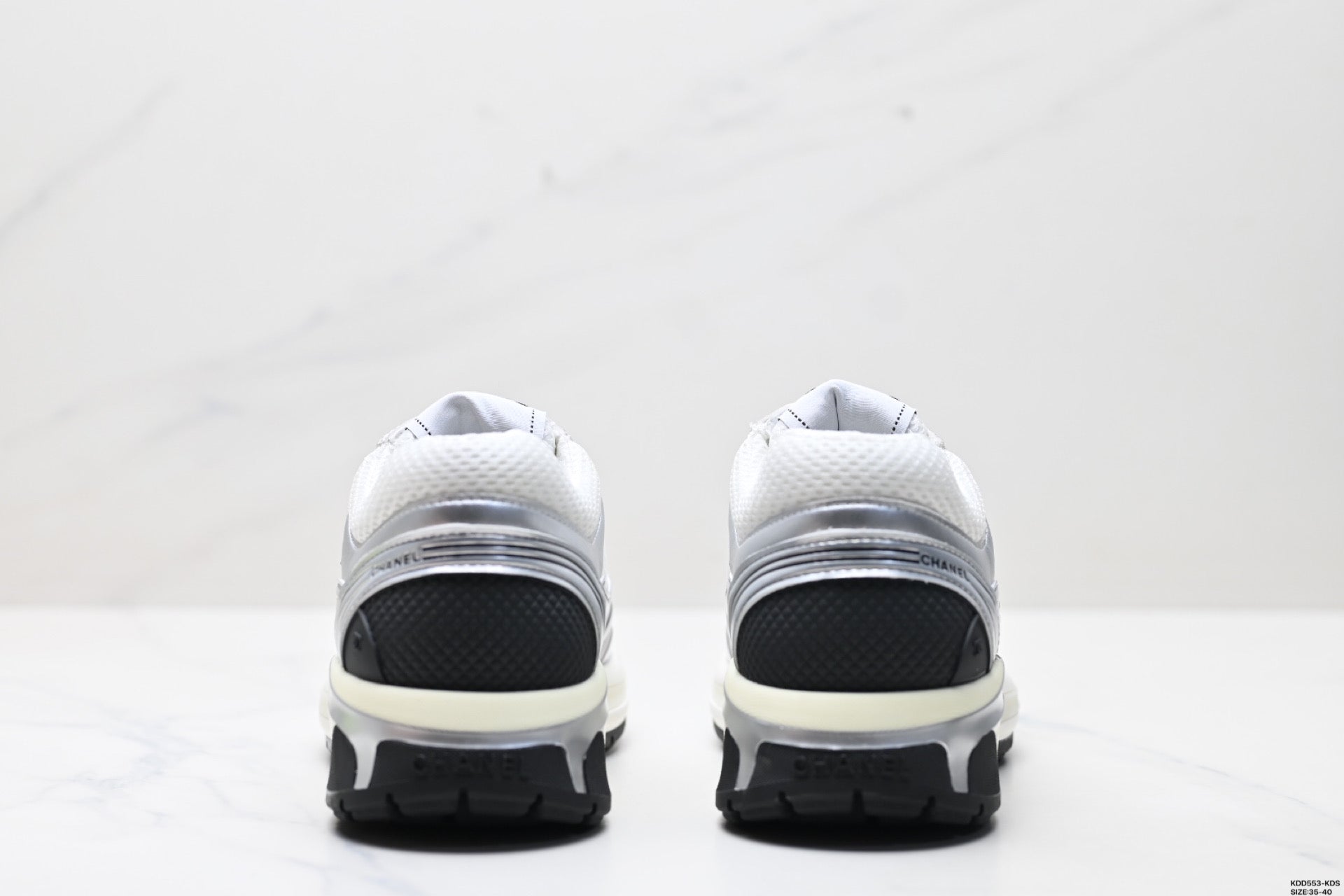 Chanel Leather Logo Low-Top Sneakers