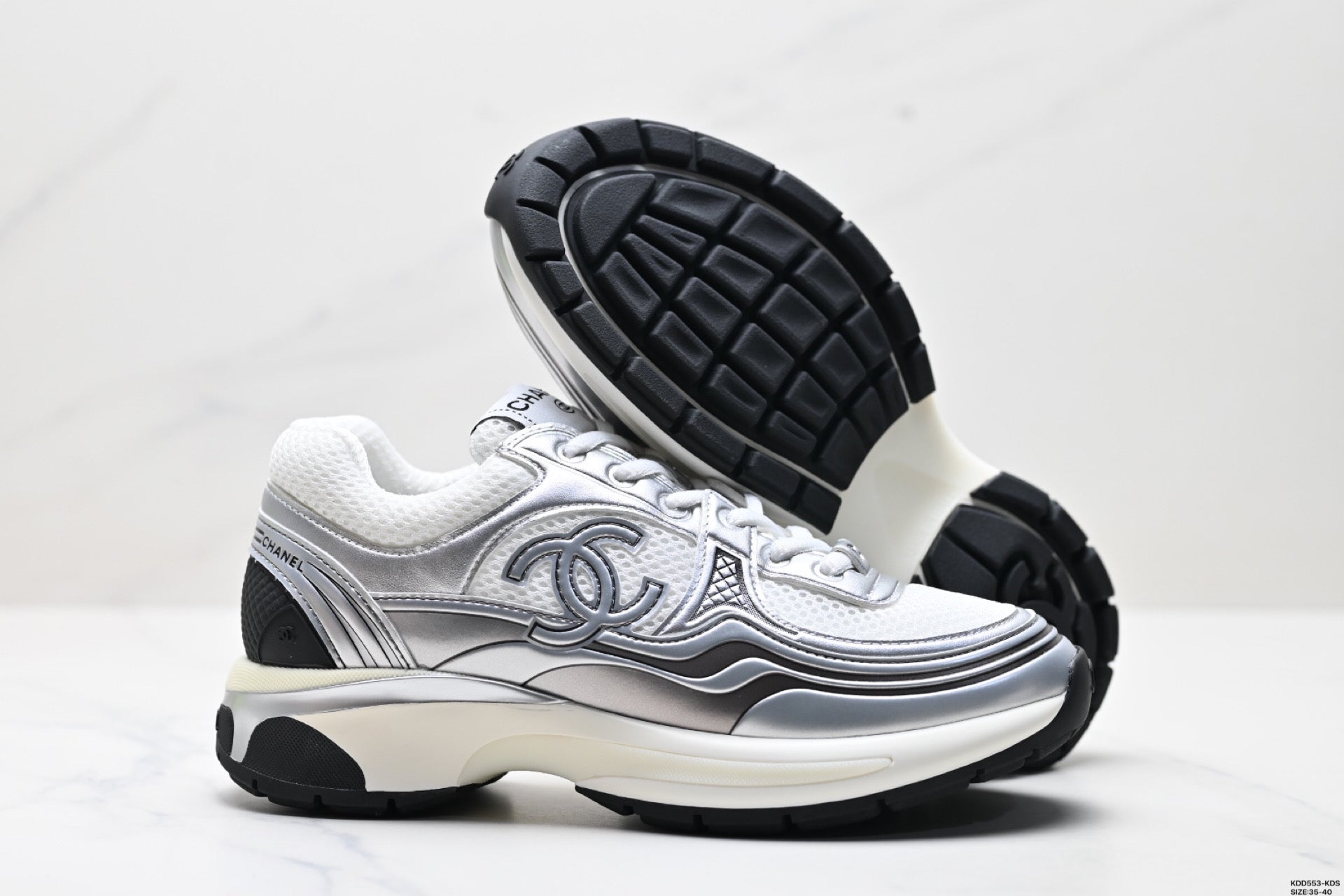 Chanel Leather Logo Low-Top Sneakers