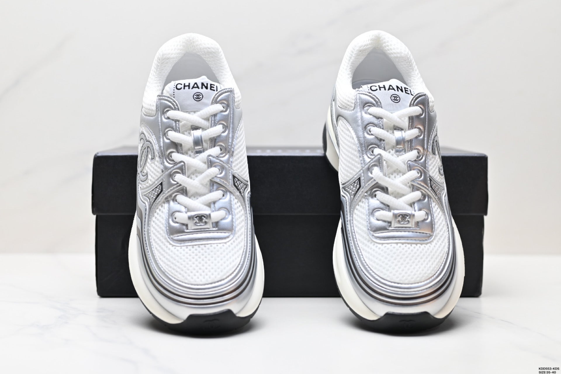 Chanel Leather Logo Low-Top Sneakers